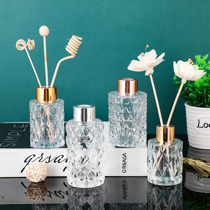 Embossed diffuser bottles